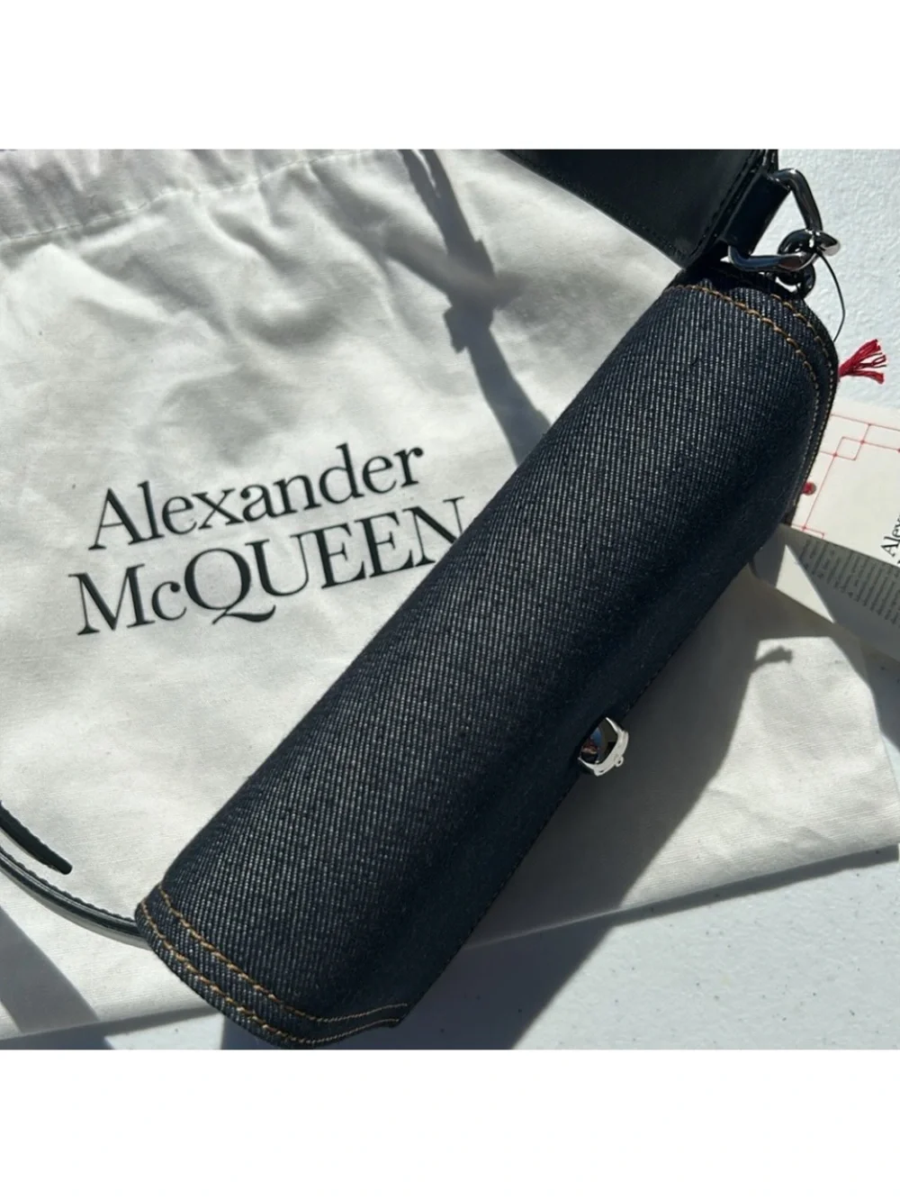 New pre-authenticated Alexander McQueen skull denim bag with dust bag